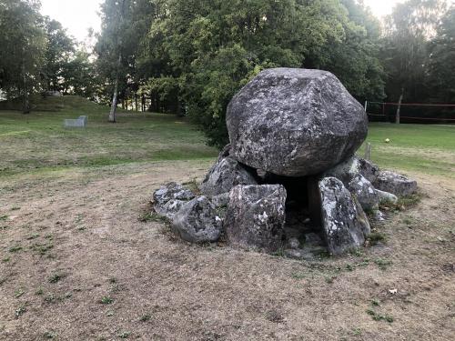 Front of the dolmen where one can see the mound of the second dolmen in the background.