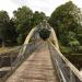 Standing on the bridge.