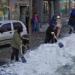 People shoveling snow