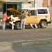 Guys working on a vehicle