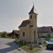 Small church in a road crossing