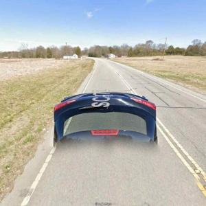 Google car forgot the back was open (StreetView)
